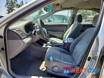 Zdjęcie 7 z 12 samochodu: 2002 TOYOTA CAMRY LE VIN:JTDBE32K320020966 - miniatura