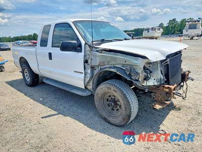 Czwarte zdjęcie samochodu z boku: 2002 FORD F250 SUPER DUTY VIN:1FTNX21F72ED11320 - miniatura