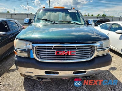 Piąte zdjęcie samochodu w środku: 2002 GMC SIERRA K2500 HEAVY DUTY VIN:1GTHK29182E166633 - miniatura