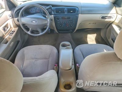 Zdjęcie 8 z 12 samochodu: 2000 FORD TAURUS LX VIN:1FAFP5221YG248543 - miniatura