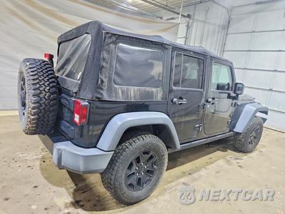 Trzecie zdjęcie samochodu z tyłu: 2014 JEEP WRANGLER UNLIMITED SPORT VIN:1C4BJWDG2EL233352 - miniatura
