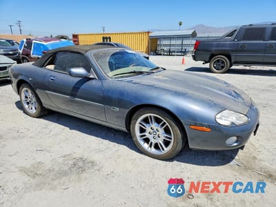 Czwarte zdjęcie samochodu z boku: 2001 JAGUAR XK8 VIN:SAJDA42C31NA11063 - miniatura