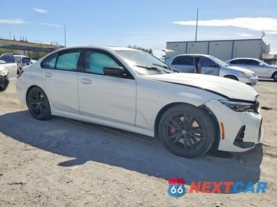 Czwarte zdjęcie samochodu z boku: 2024 BMW 330I VIN:3MW69FF00R8E55621 - miniatura