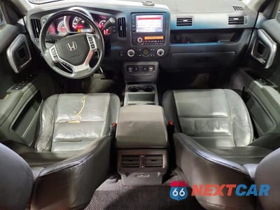 Zdjęcie 8 z 12 samochodu: 2006 HONDA RIDGELINE RTL VIN:2HJYK16536H505228 - miniatura