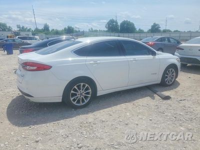 Trzecie zdjęcie samochodu z tyłu: 2017 FORD FUSION SE HYBRID VIN:3FA6P0LU4HR409740 - miniatura
