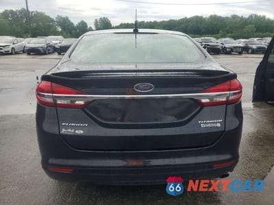 Zdjęcie 6 z 13 samochodu: 2017 FORD FUSION TITANIUM PHEV VIN:3FA6P0SU3HR151972 - miniatura