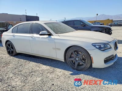 Czwarte zdjęcie samochodu z boku: 2015 BMW 750 LI VIN:WBAYE8C58FD781620 - miniatura