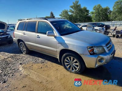 Czwarte zdjęcie samochodu z boku: 2006 TOYOTA HIGHLANDER HYBRID VIN:JTEEW21A760003974 - miniatura