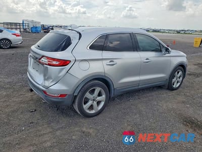 Trzecie zdjęcie samochodu z tyłu: 2015 LINCOLN MKC VIN:5LMCJ1A96FUJ18223 - miniatura