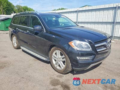Czwarte zdjęcie samochodu z boku: 2016 MERCEDES-BENZ GL 450 4MATIC VIN:4JGDF6EE1GA625384 - miniatura