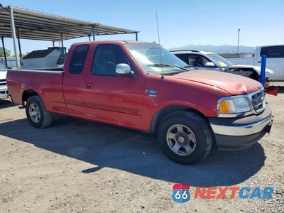 Czwarte zdjęcie samochodu z boku: 2002 FORD F150 VIN:1FTRX17L02NA63890 - miniatura