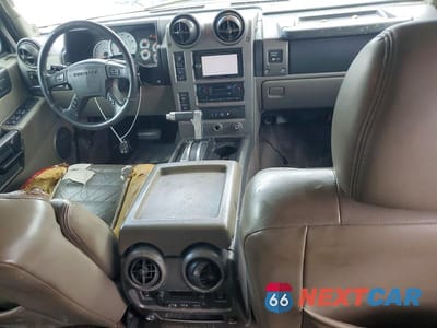 Zdjęcie 8 z 12 samochodu: 2003 HUMMER H2 VIN:5GRGN23UX3H145531 - miniatura