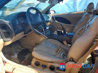 Zdjęcie 7 z 12 samochodu: 1999 MITSUBISHI ECLIPSE SPYDER GST VIN:4A3AX55F7XE063794 - miniatura