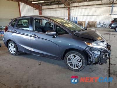 Czwarte zdjęcie samochodu z boku: 2019 HONDA FIT LX VIN:3HGGK5H48KM704896 - miniatura