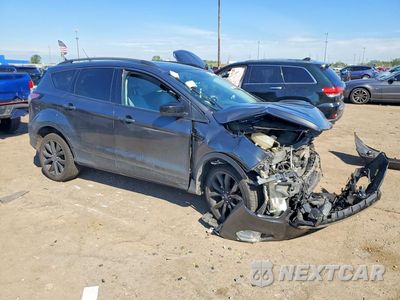 Czwarte zdjęcie samochodu z boku: 2017 FORD ESCAPE SE VIN:1FMCU9GD6HUD17599 - miniatura