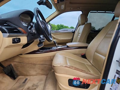 Zdjęcie 7 z 13 samochodu: 2013 BMW X5 XDRIVE35I VIN:5UXZV4C50D0B03353 - miniatura