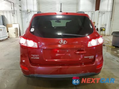 Zdjęcie 6 z 14 samochodu: 2011 HYUNDAI SANTA FE GLS VIN:5XYZGDAB2BG020452 - miniatura