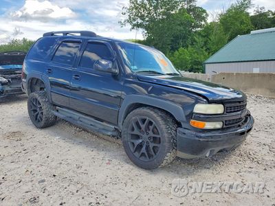 Czwarte zdjęcie samochodu z boku: 2003 CHEVROLET TAHOE K1500 VIN:1GNEK13T43R220339 - miniatura