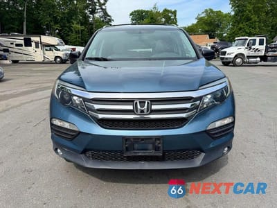 Piąte zdjęcie samochodu w środku: 2016 HONDA PILOT EXL VIN:5FNYF6H50GB024007 - miniatura