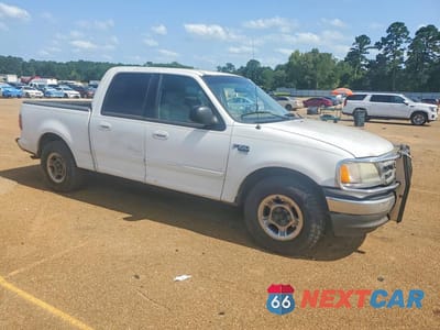 Czwarte zdjęcie samochodu z boku: 2003 FORD F150 SUPERCREW VIN:1FTRW07L33KA66282 - miniatura