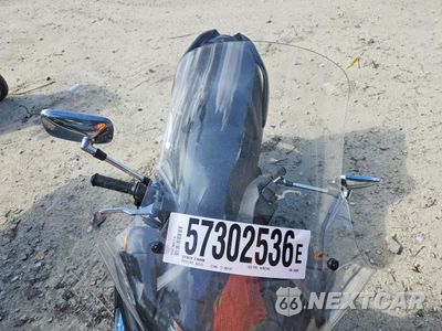 Piąte zdjęcie samochodu w środku: 2014 SUZUKI AN400 A VIN:JS1CK44B0E2100082 - miniatura