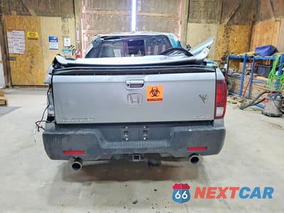 Zdjęcie 6 z 12 samochodu: 2023 HONDA RIDGELINE RTL-E VIN:5FPYK3F79PB054712 - miniatura