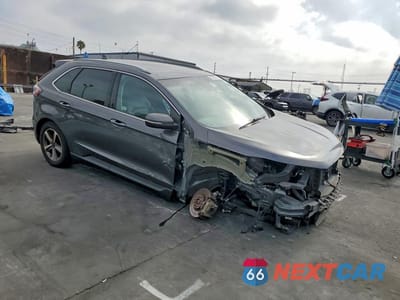 Czwarte zdjęcie samochodu z boku: 2020 FORD EDGE SEL VIN:2FMPK3J95LBB18292 - miniatura