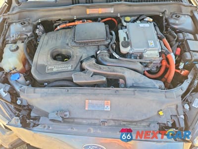 Zdjęcie 11 z 12 samochodu: 2015 FORD FUSION SE PHEV VIN:3FA6P0PU3FR307613 - miniatura