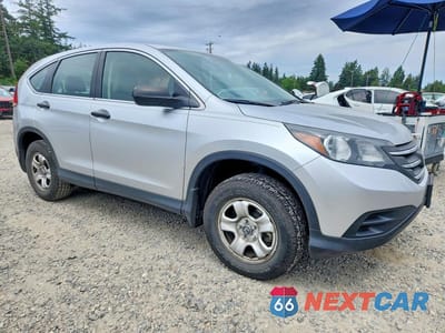 Czwarte zdjęcie samochodu z boku: 2013 HONDA CR-V LX VIN:2HKRM4H39DH628276 - miniatura