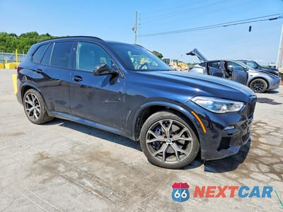 Czwarte zdjęcie samochodu z boku: 2021 BMW X5 XDRIVE45E VIN:5UXTA6C05M9D83994 - miniatura