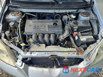 Zdjęcie 11 z 12 samochodu: 2005 TOYOTA MATRIX XR VIN:2T1LR32E75C507052 - miniatura