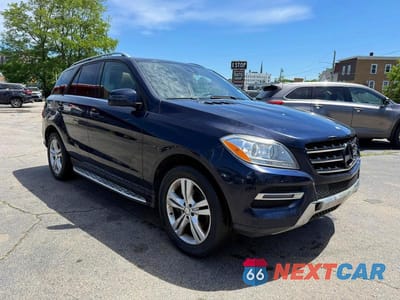 Czwarte zdjęcie samochodu z boku: 2015 MERCEDES-BENZ ML 350 4MATIC VIN:4JGDA5HB7FA461597 - miniatura
