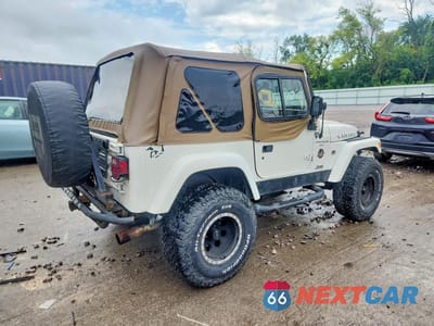 Trzecie zdjęcie samochodu z tyłu: 1999 JEEP WRANGLER / TJ SAHARA VIN:1J4FY49S9XP465466 - miniatura
