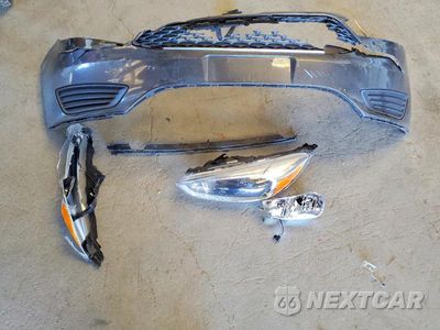 Zdjęcie 12 z 13 samochodu: 2018 FORD FOCUS SE VIN:1FADP3FEXJL205204 - miniatura