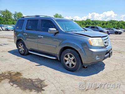 Czwarte zdjęcie samochodu z boku: 2011 HONDA PILOT TOURING VIN:5FNYF4H92BB064265 - miniatura