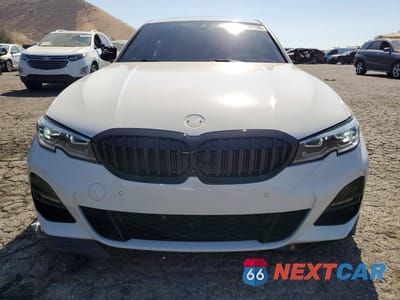 Piąte zdjęcie samochodu w środku: 2021 BMW 330I VIN:3MW5R1J09M8C15904 - miniatura