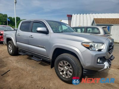 Czwarte zdjęcie samochodu z boku: 2019 TOYOTA TACOMA SR5 V6 VIN:3TMCZ5AN5KM242485 - miniatura
