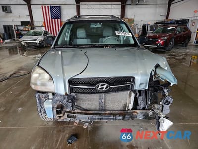 Piąte zdjęcie samochodu w środku: 2006 HYUNDAI TUCSON GL VIN:KM8JM12B06U482625 - miniatura