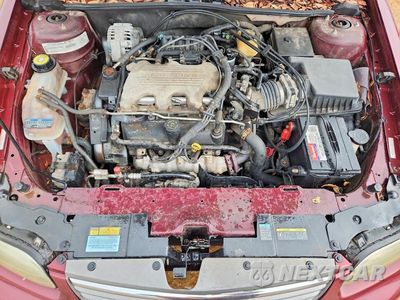 Zdjęcie 11 z 12 samochodu: 1998 CHEVROLET MALIBU VIN:1G1ND52M8WY120557 - miniatura