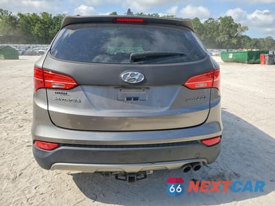 Zdjęcie 6 z 13 samochodu: 2014 HYUNDAI SANTA FE SPORT 2.0T VIN:5XYZW3LA9EG149679 - miniatura
