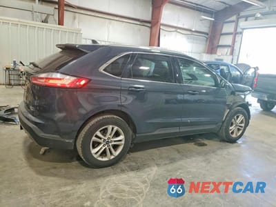 Trzecie zdjęcie samochodu z tyłu: 2019 FORD EDGE SEL VIN:2FMPK4J90KBB13800 - miniatura