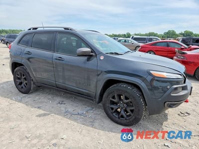 Czwarte zdjęcie samochodu z boku: 2016 JEEP CHEROKEE TRAILHAWK VIN:1C4PJMBS7GW323079 - miniatura