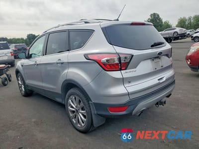 Drugie zdjęcie samochodu z przodu: 2017 FORD ESCAPE TITANIUM VIN:1FMCU9J90HUA51307 - miniatura