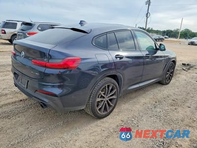 Trzecie zdjęcie samochodu z tyłu: 2021 BMW X4 VIN:5UX2V1C01M9E46284 - miniatura