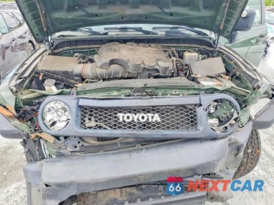Zdjęcie 12 z 13 samochodu: 2010 TOYOTA FJ CRUISER BASE VIN:JTEBU4BF1AK075426 - miniatura