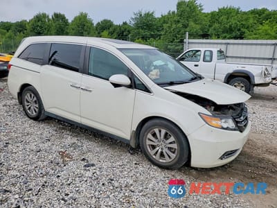 Czwarte zdjęcie samochodu z boku: 2017 HONDA ODYSSEY EXL VIN:5FNRL5H69HB005098 - miniatura
