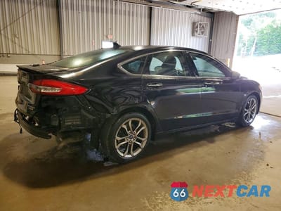 Trzecie zdjęcie samochodu z tyłu: 2020 FORD FUSION TITANIUM VIN:3FA6P0RU6LR139541 - miniatura