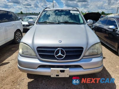 Piąte zdjęcie samochodu w środku: 2001 MERCEDES-BENZ ML 430 VIN:4JGAB72E21A280348 - miniatura