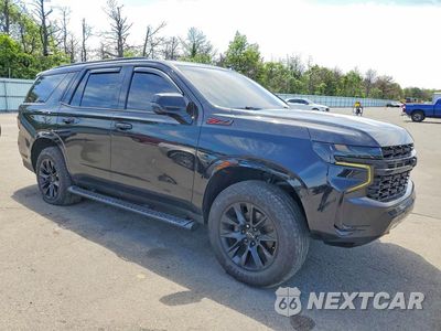 Czwarte zdjęcie samochodu z boku: 2021 CHEVROLET TAHOE K1500 Z71 VIN:1GNSKPKD5MR146673 - miniatura