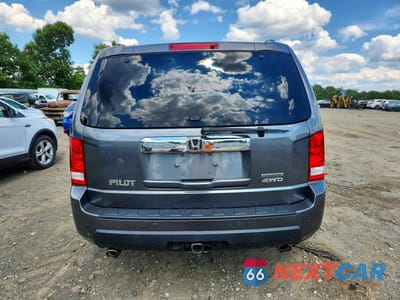 Zdjęcie 6 z 13 samochodu: 2011 HONDA PILOT TOURING VIN:5FNYF4H92BB100830 - miniatura